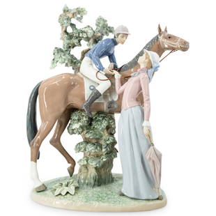 Lladro "Jockey With Lass" Porcelain Grouping: DESCRIPTION: Lladro porcelain figure entitled "Jockey with Lass" ("Jockey and Maiden"/ "Jockey y Damita") designed by Francisco Catala depicting a jockey on horseback interacting with a maiden adjacen