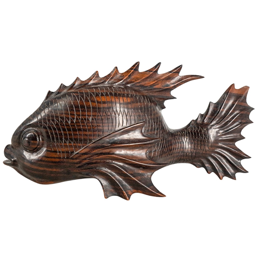 Antique Chinese Carved Wood Fish: DESCRIPTION: Carved wood sculpture depicting a spiny fish with textured scales and large eyes. CIRCA: 20th Century ORIGIN: China DIMENSIONS: H: 6.25" W: 4" L: 12.75" CONDITION: Chip on tail fin Unless