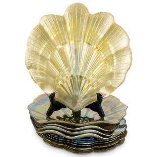 (10 Pc) Turkish Iridescent Glass Shell Form Table Chargers: DESCRIPTION: 10 Turkish iridescent glass table chargers, two larger and eight smaller, each in the form of a shell. Label adhered to one smaller charger. CIRCA: Late 20th - Early 21st Century ORIGIN: