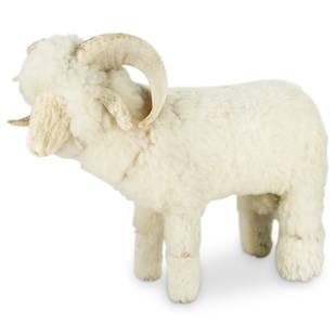 Mid Century Sculptural Lamb Ottoman Footrest: DESCRIPTION: Mid Century figural, life-size lamb ottoman, bench or footrest composed of a wood foundation covered in genuine wool, with leather ears, and mounted horns. CIRCA: 1950s ORIGIN: Probably