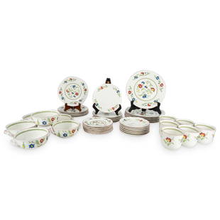 (42 Pc) Villeroy & Boch "Persia" Porcelain Dinnerware Set: DESCRIPTION: (42 Pc) Villeroy & Boch glazed porcelain dinnerware set, in the "Persia" pattern. Depicting floral motifs with polychrome flowers, scalloped rim and red trim. This set includes the