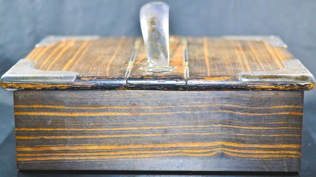 Antique English wood box silver overlaid: DESCRIPTION: Antique English rare wood double sided box silver overlaid with a silver handle. Hallmarked on the silver J.G.B.E.E.B CIRCA: 19th ct MADE IN: England DIMENSIONS: H5.5" L:10" W:7.5"