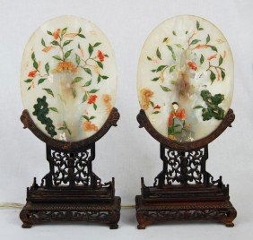 Antique Chinese multi stone Table Lamps: DESCRIPTION: Pair of antique Chinese floral alabaster glass with multi color hard stone and hand carved wood table lamps. Minor cracks on the wood and minor repairs. One is missing figurine CIRCA: 19t