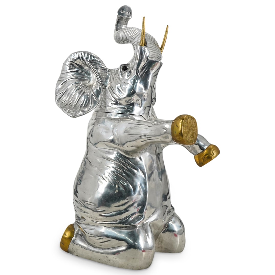 Arthur Court Elephant Wine Cooler: DESCRIPTION: A large Arthur Court elephant ice/wine bucket. This is a wine and champagne cooler, shaped like an elephant standing upright, featuring a hinge at the base of the neck concealing a hollow