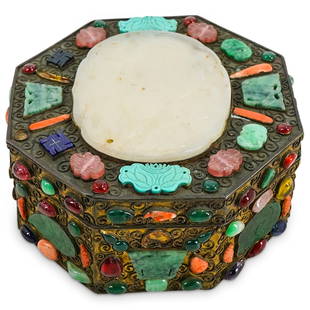 Antique Chinese Silver Wash White Jade, Coral, Tourmaline Octagonal Box: DESCRIPTION: Octagonal silver wash metal box adorned on its lid with a large white jade medallion carved to depict a pomegranate in a footed dish. Piece is decorated throughout with jade, tourmaline,