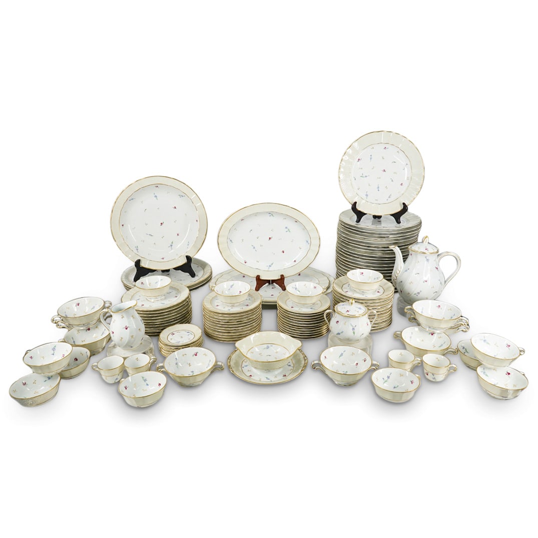 (114 Pc) L. Bernardaud & Cie "Pompadour" Porcelain Service: DESCRIPTION: L. Bernardaud & Cie "Pompadour" Limoges porcelain service composed of 114 pieces, each featuring scalloping, floral motifs and gilt accents, and each marked on underside. (22) Dinner plat