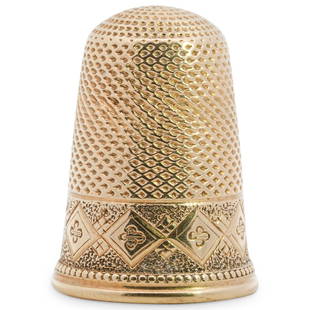 Antique Victorian 18K Gold Thimble: DESCRIPTION: Antique Victorian 18 karat gold sewing thimble featuring quatrefoil motif and inscribed "M. C. / Christmas / 1866". Includes box. Total weight of thimble: 5.6 g / 3.7 dwt. CIRCA: 1866 ORI