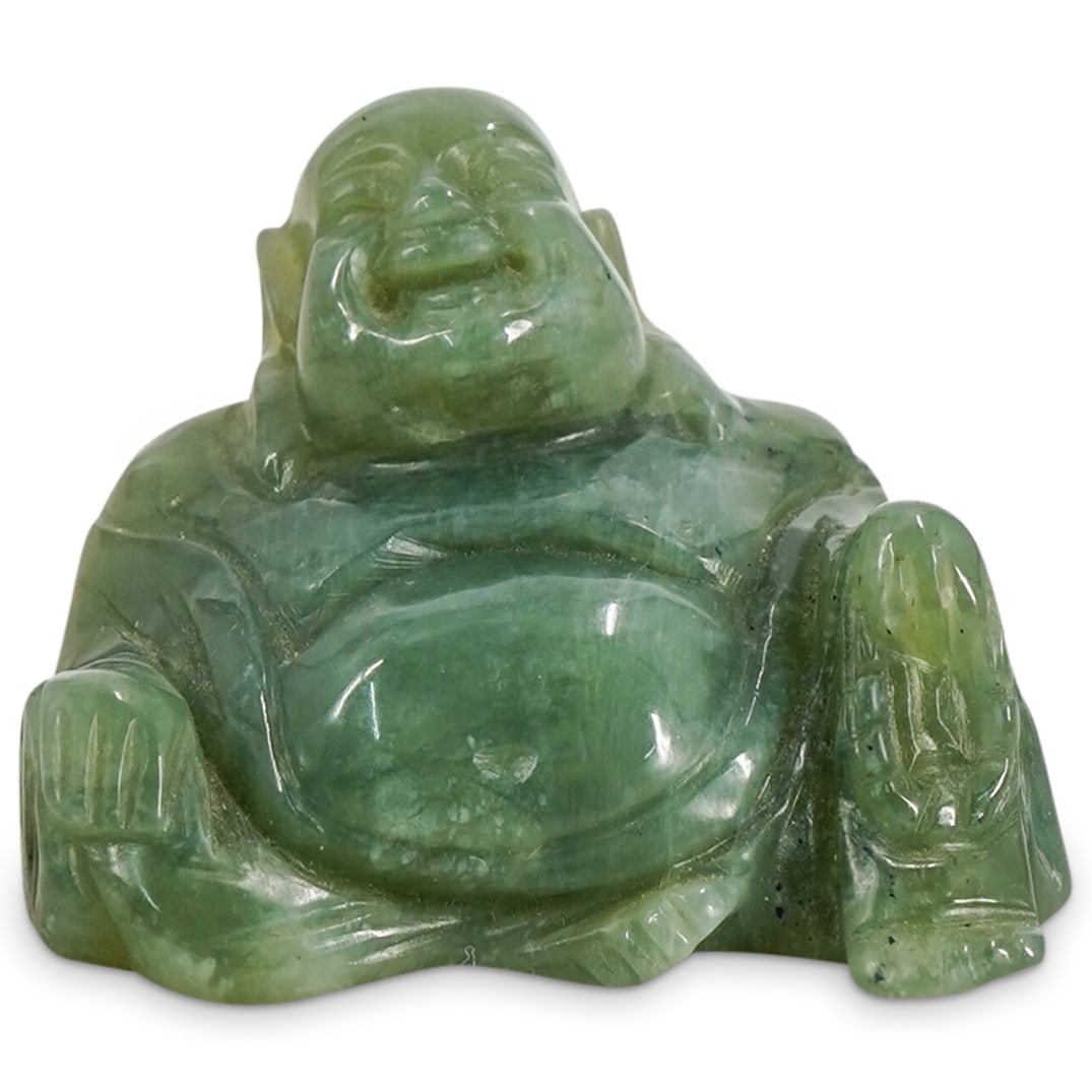 Chinese Carved Jade Laughing Buddha: DESCRIPTION: A Chinese carved jade sculpture depicting a laughing buddha. CIRCA: Mid 20th Cent. ORIGIN: China DIMENSIONS: H: 1.75" W: 2.75" CONDITION: Great Condition. Unless otherwise stated, all inf