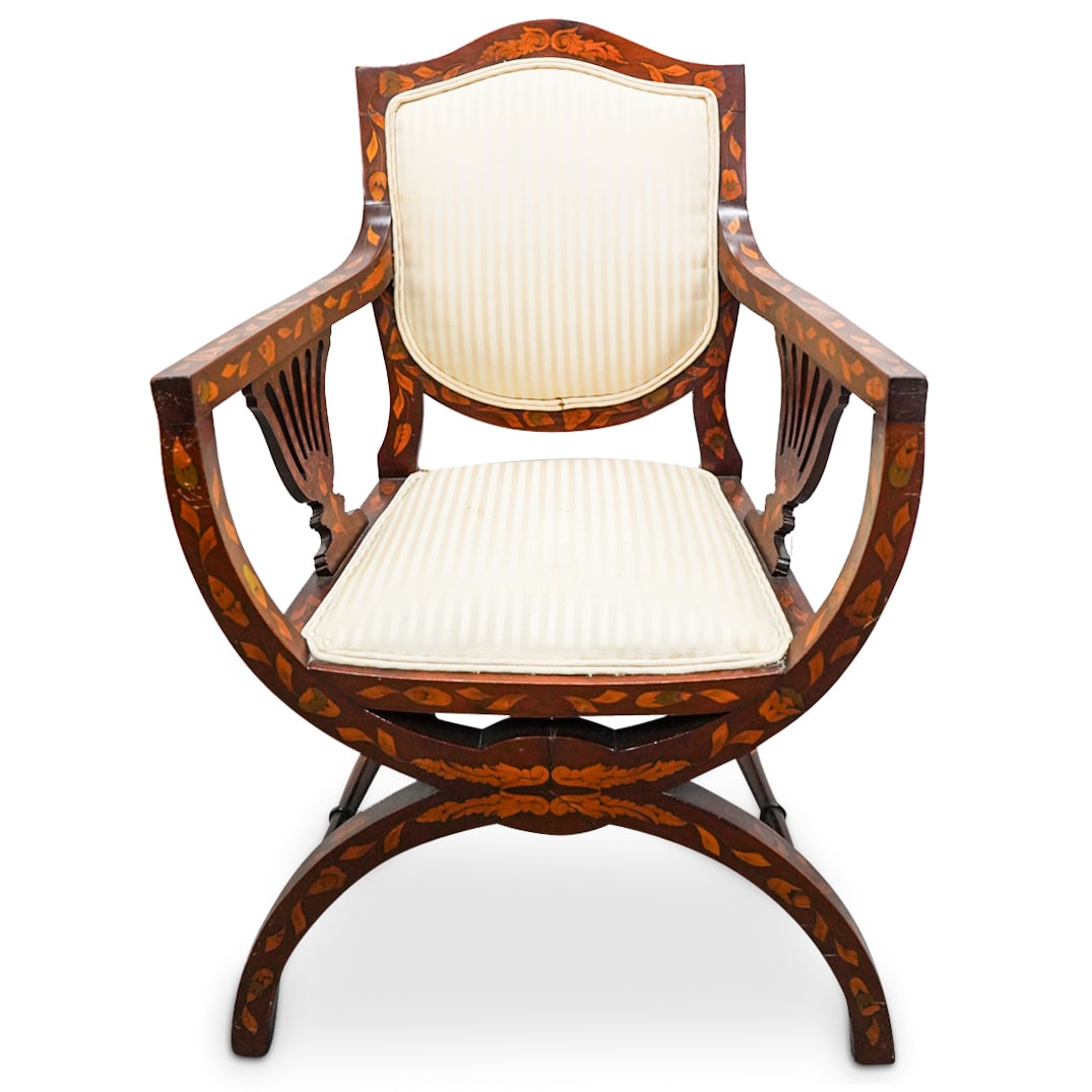 Manner of William & Mary Marquetry Armchair: DESCRIPTION: Manner of William & Mary marquetry armchair with brown wood foundation and floral inlaid design completed with gold and beige silk upholstery, CIRCA: 20th Cent. ORIGIN: Continental DIMENS