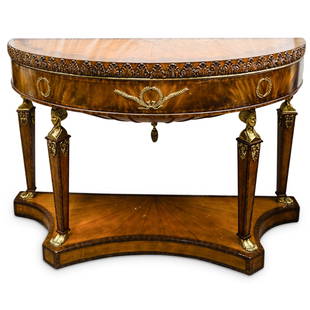 Maitland Smith Marquetry Inlaid Empire Style Demilune Console Table: DESCRIPTION: Maitland-Smith demilune console table featuring a top adorned with gilt wreath applications and supported by columns crafted with figural capitals and mounted on a wooden base. Top and