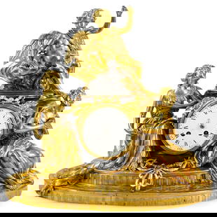 Antique French Neoclassical Gilt Bronze Mantel Clock: DESCRIPTION: A gilt bronze clock surmounted by a a cupid figure observing two robed woman and a grand tour bronze of a putti riding a dolphin. Piece is further accented by ribbon and open work ornate