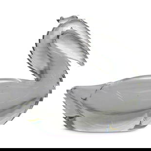 Steuben Glass Resting Pelican Paperweight: DESCRIPTION: Steuben clear glass resting pelican. Marked on underside: "Steuben". (PB) CIRCA: 20th Cent. ORIGIN: USA DIMENSIONS: H: 5.5" W: 3" L: 7" CONDITION: Great Condition. Unless otherwise stated