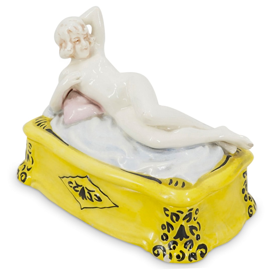 Art Deco Royal Dux Porcelain Box: DESCRIPTION: Antique or vintage Art Deco Royal Dux porcelain box featuring reclining nude woman and yellow ground. Marked on underside. CIRCA: Early - Mid 20th Century ORIGIN: Bohemian / Czechoslovaki