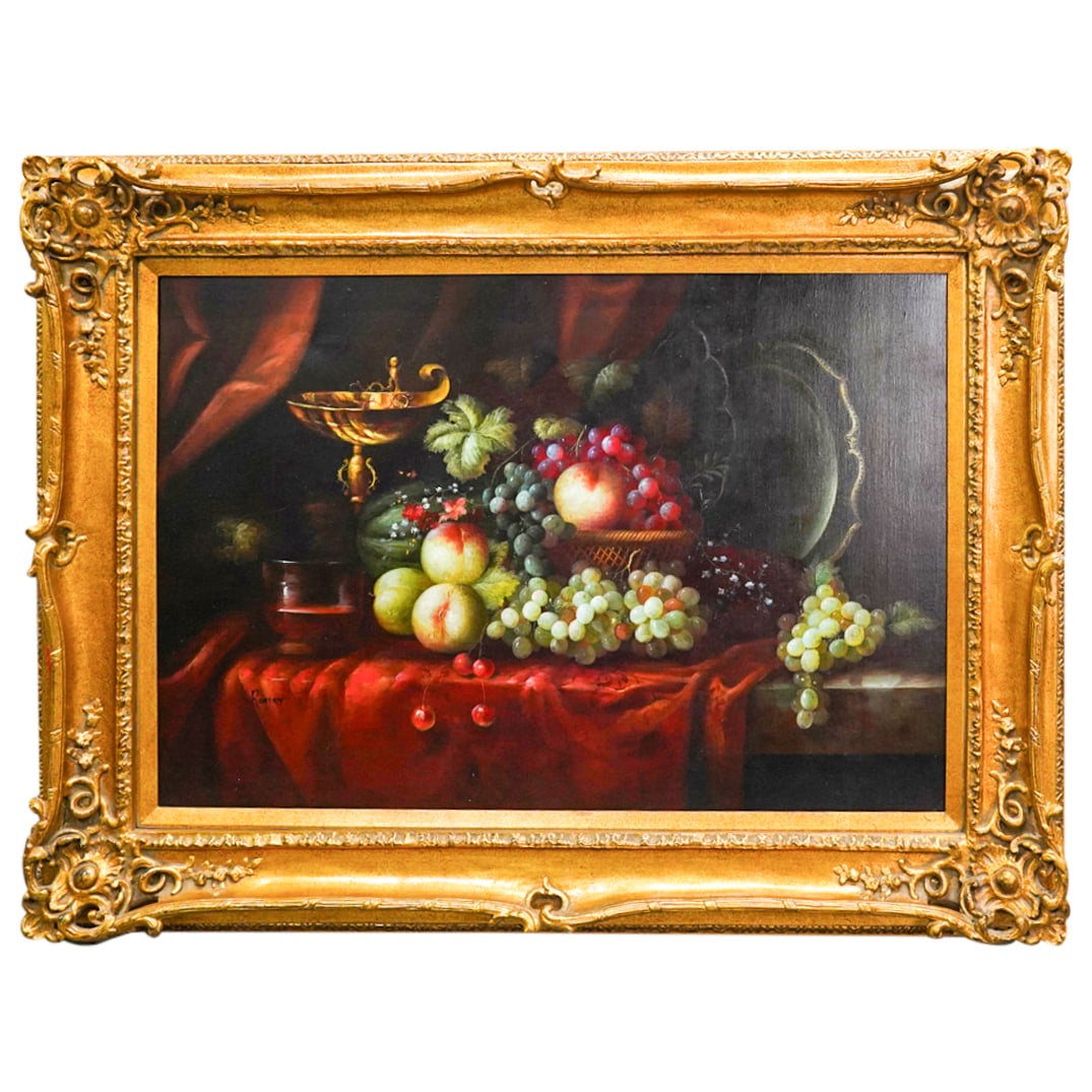 Jacob Ronsky (20th C.) Fruit Still Life Oil On Canvas: DESCRIPTION: Oil on canvas painting by Jacob Ronsky depicting a still life of fruit and arious tableware spread on a drape on a table. Signed at lower left. Mounted in a gilt, pierced, foliage-laden f