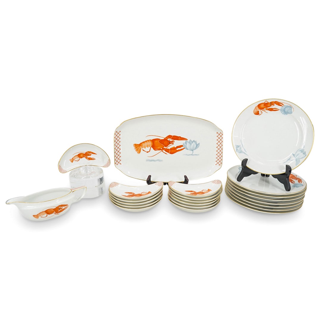 (22 Pc) Vintage Rosenthal Fish And Shellfish Porcelain Service: DESCRIPTION: 22 piece Rosenthal porcelain fish and shellfish service featuring a discontinued pattern and composed of dinner plates, fish bone plates, a platter, and a gravy boat, each decorated with