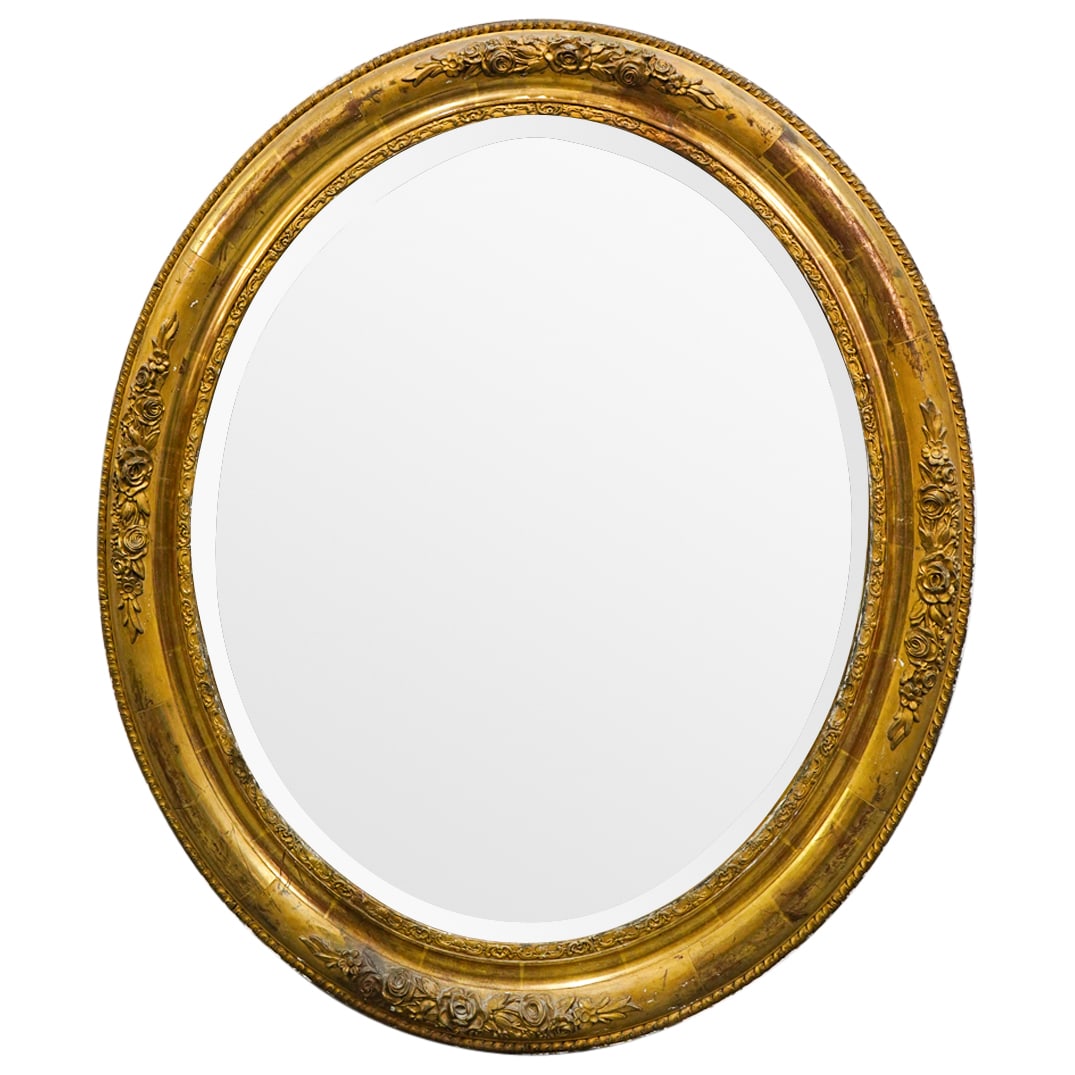 Antique French Carved And Giltwood Mirror: DESCRIPTION: Antique carved wood mirror featuring a frame fashioned with flowers and foliage and completed with a gilt finish. CIRCA: Late 19th to early 20th Century ORIGIN: France DIMENSIONS: H: 31" 