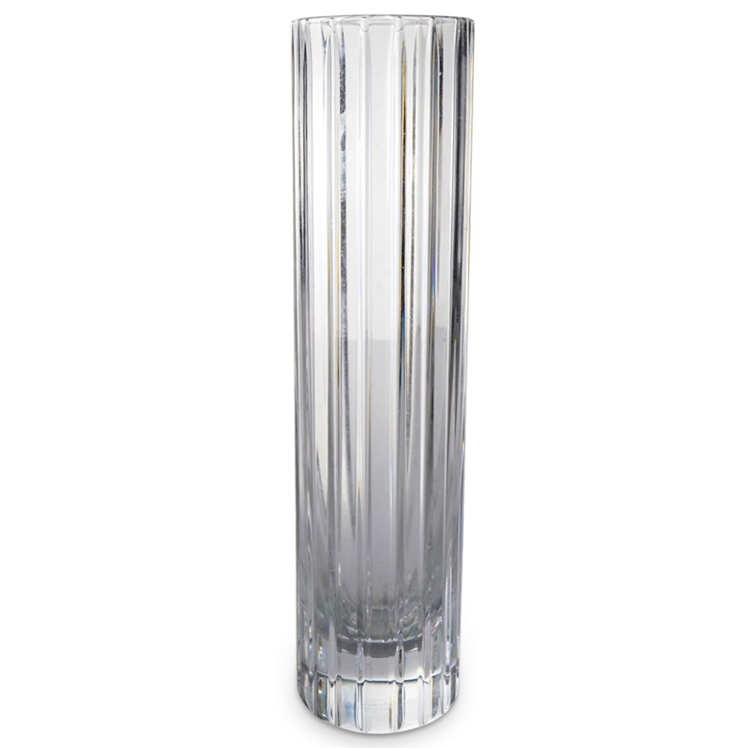 Baccarat Crystal "Harmonie" 7" Bud Vase: DESCRIPTION: Baccarat Crystal "Harmonie" 7" Bud Vase. Designed with a tubular form and cut vertical lines. Marked with Baccarat hallmark on the underside. CIRCA: 20th Century ORIGIN: France DIMENSIONS