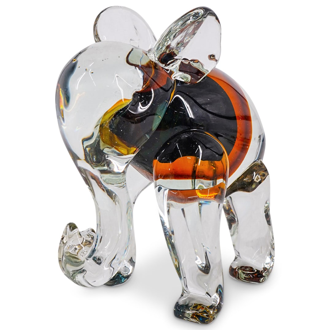 Murano Glass Sommerso Elephant: DESCRIPTION: Murano art glass elephant sculpture featuring sommerso technique. Unmarked. CIRCA: Late 20th - Early 21st Century ORIGIN: Italian DIMENSIONS: H: 7.25" W: 4.25" L: 6.75" CONDITION: Minor a