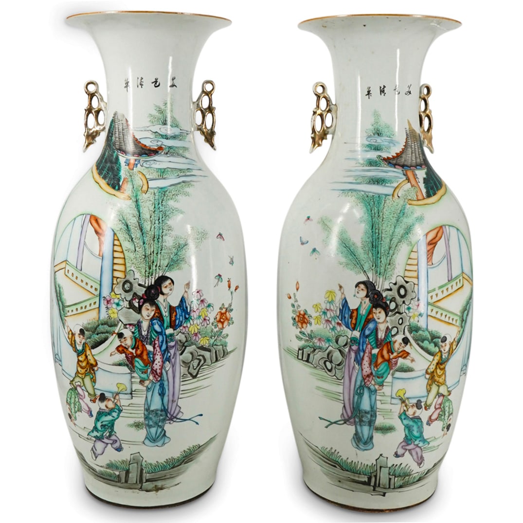 Pair Of Antique Chinese Famille Verte Mirrored Porcelain Vases: DESCRIPTION: Two mirrored famille verte vases, each crafted with pierced, gilt handles and decorated with an image of women with children in a garden. CIRCA: Late 19th to early 20th Century ORIGIN: Ch