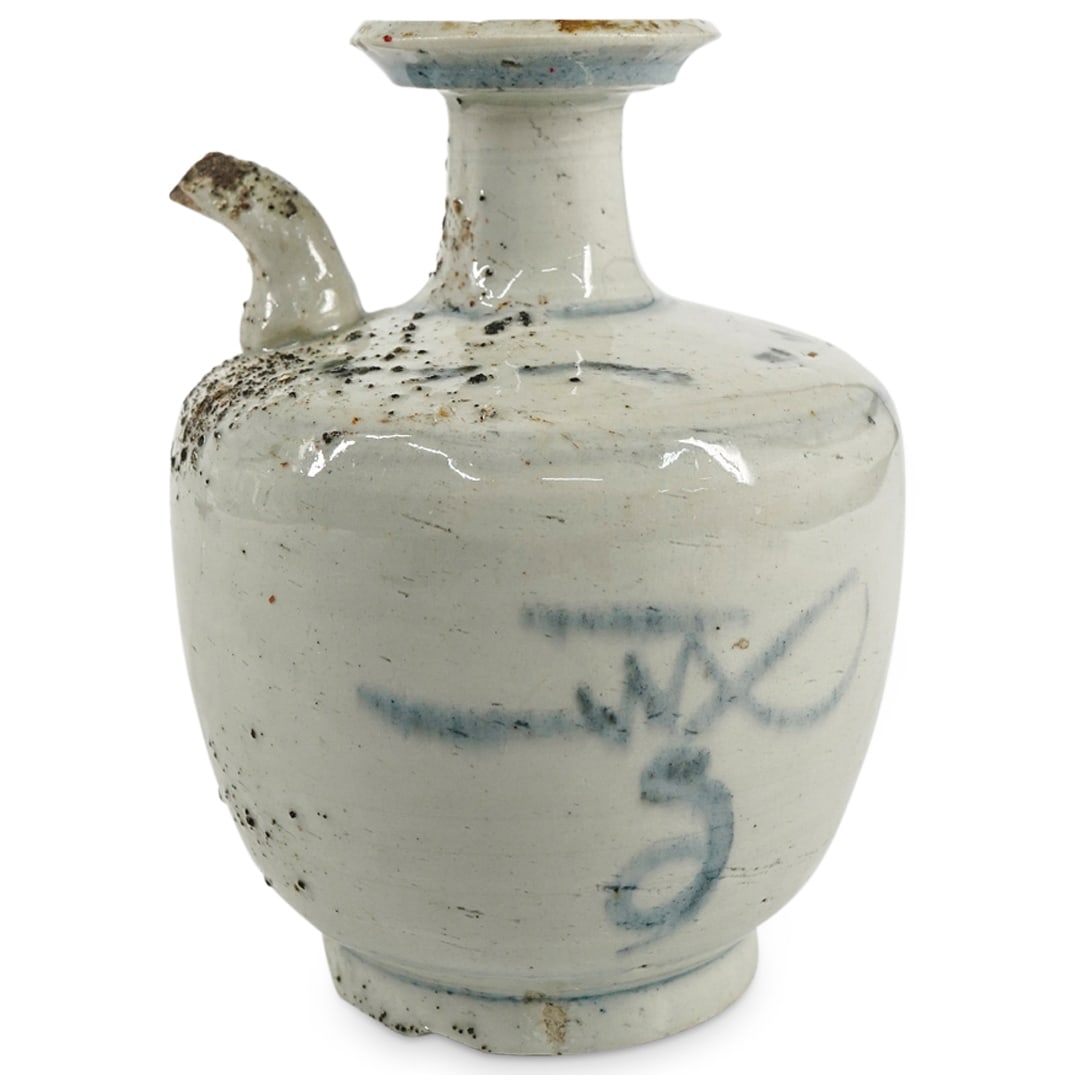 Antique Chinese Provincial Ceramic Wine Ewer: DESCRIPTION: Antique Chinese provincial ceramic wine ewer featuring abstract motifs. CIRCA: 19th Century ORIGIN: Chinese DIMENSIONS: H: 5.25" Diameter: 4" CONDITION: Moderate chip to spout. Two modera