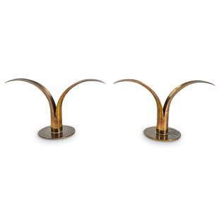 (2 Pc) Swedish Mid Century Ystad Brass Lily Candlestick Holders: DESCRIPTION: (2 Pc) Pair of Mid Century Swedish modern brass candlesticks designed by Ivar Alenius Bjork for Ystad. Stamped. Ivar Alenius Bjork (1905 - 1978) is a Swedish sculptor. In the 1940s, he de