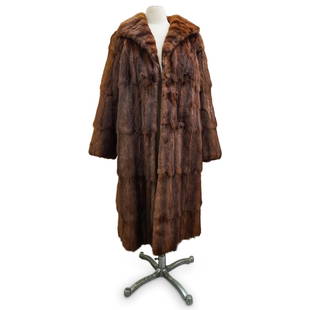 VIntage Designer Jean-Louis Scherrer Ladies Mink Fur Coat: DESCRIPTION: A vintage designer Jean-Louis Scherrer brown fur coat with frontal closure, 3/4-length sleeves and side pockets. Designed with a brown mink exterior and fully lined in dark brown lining.