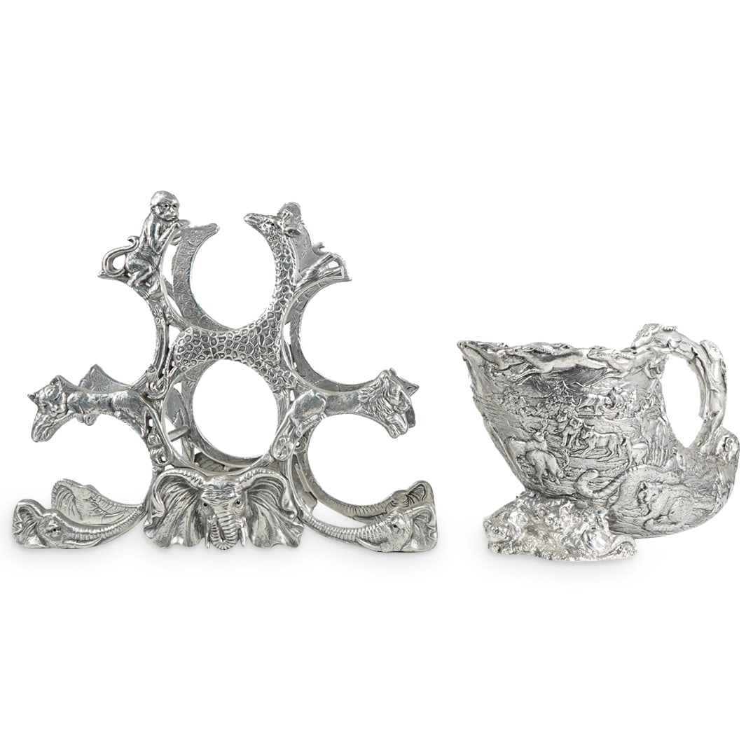 (2 Pc) Arthur Court Wine Rack & Wine Cooler: DESCRIPTION: Two Arthur Court designer aluminum items: (1) Wine rack for six bottles featuring elephant, lion, monkey and giraffe motifs. H: 12" W: 6.25" L: 14.5" (1) Wine cooler in the form of a horn