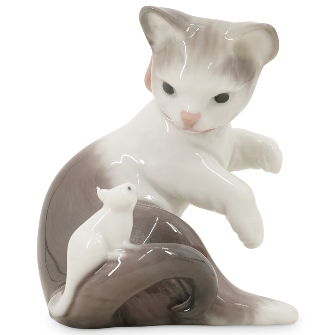 Lladro Porcelain "Cat And Mouse" Figurine: DESCRIPTION: Lladro porcelain figurine titled "Cat And Mouse", designed by sculptor Juan Huerta. Depicts a classic game of cat and mouse. The piece has a glazed finish. Model number: #5236. Stamped on