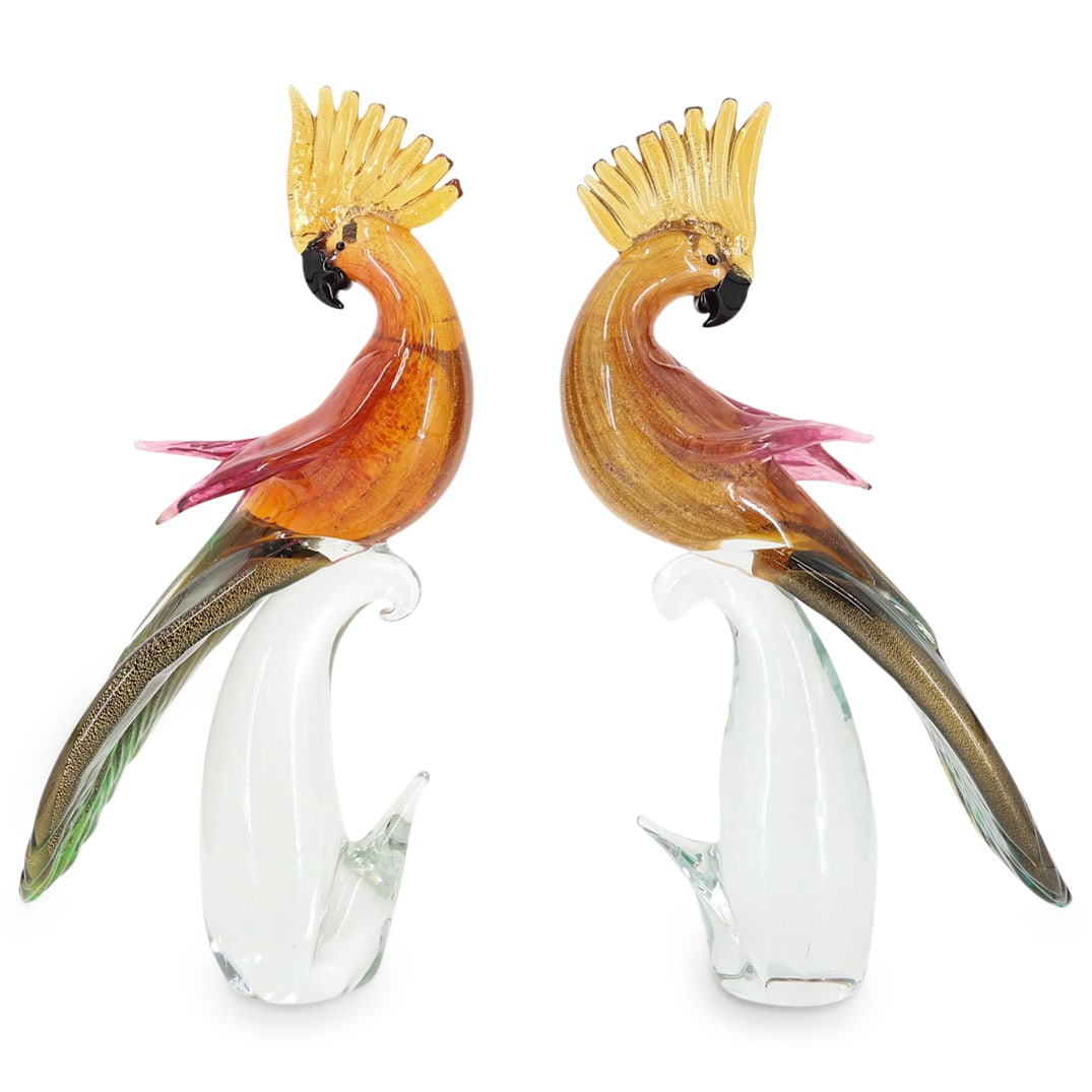 Oggetti Murano Art Glass Cockatoo Sculptures: DESCRIPTION: A Pair of signed Oggetti Murano art glass cockatoo figurine sculptures. Depicts an amber and pink cockatoo with a black beak and eyes atop a clear base. Marked with a "Murano Made in Ital