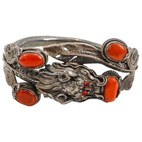 Antique Chinese Silver Dragon cuff with red coral insets.