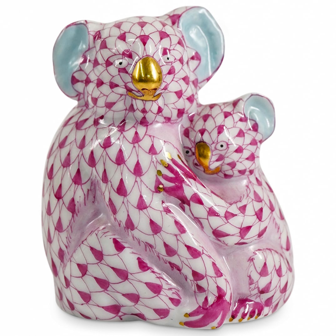 Herend Porcelain "Koala Mother & Baby" Raspberry Fishnet Figurine: DESCRIPTION: Herend porcelain "Koala Mother & Baby" figurine featuring raspberry fishnet pattern, and further embellished with gilded accents. Style number: #15478. Marked with Herend Hungary hallmark