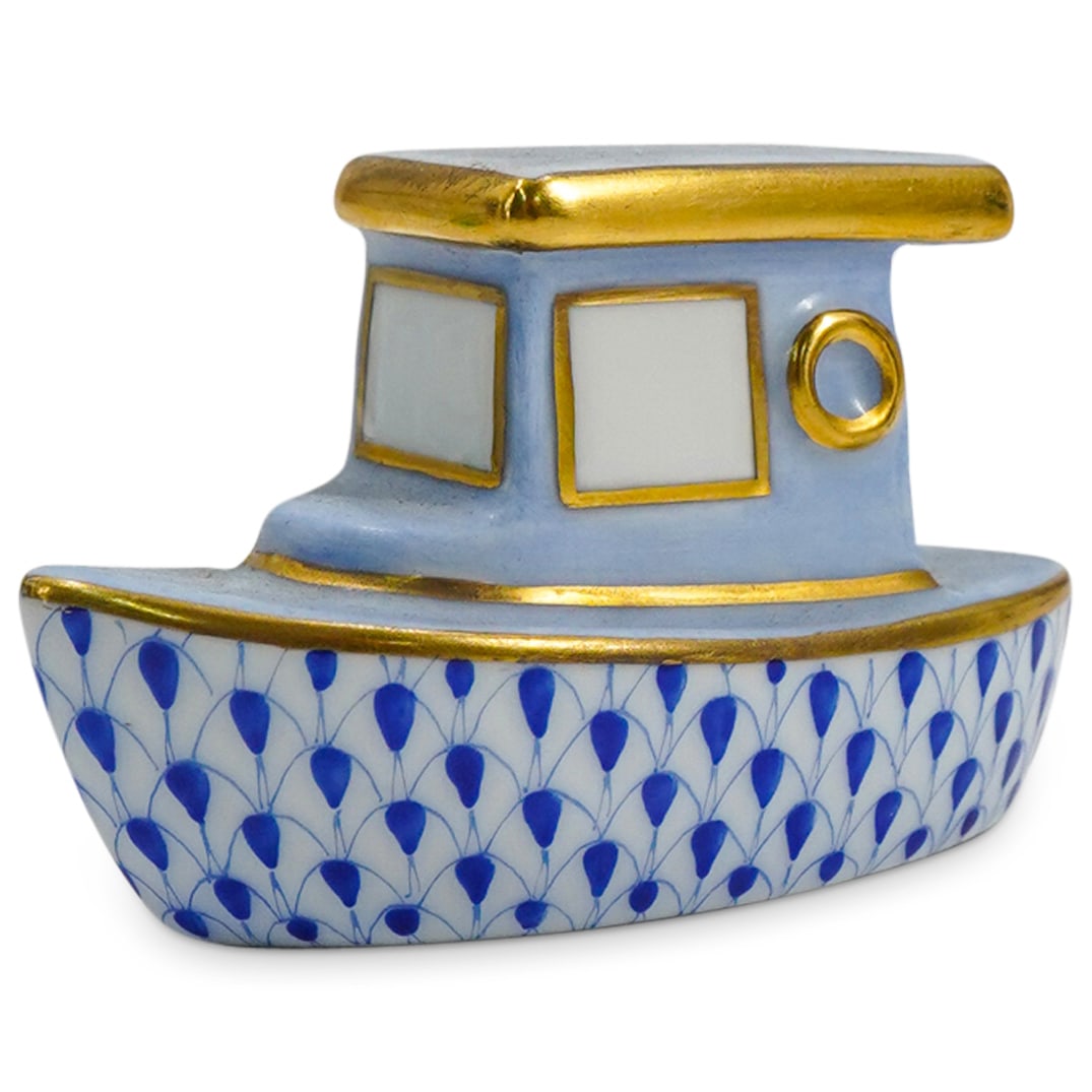Herend Porcelain "Tug Boat" Blue Fishnet Figurine: DESCRIPTION: Herend porcelain "Tug Boat" figurine embellished in a blue hued fishnet pattern. Finished with gilded accents. Marked along the underside with Herend stamps. CIRCA: 21st Century ORIGIN: H