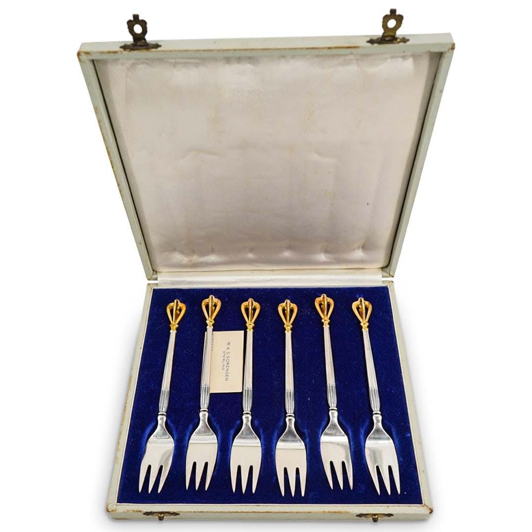 W & S Sorensen Sterling Silver Forks In Case: DESCRIPTION: Sterling silver forks by W & S Sorensen, each crafted with three tines and a handle finial resembling a vajra. Includes velvet and silk lined case. Each piece is hallmarked on underside. 