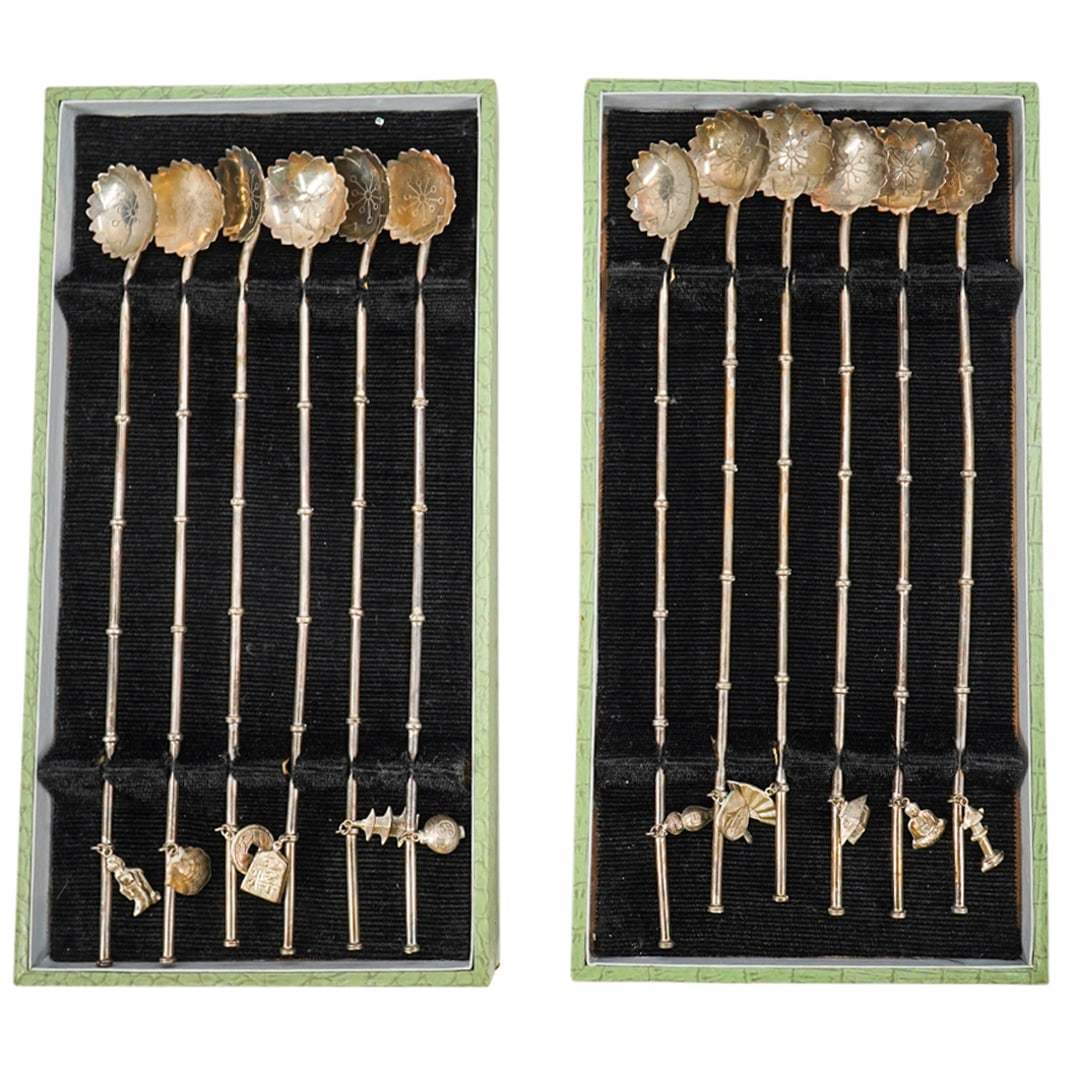 (12 Pc) Japanese 950 Silver Stirrers: DESCRIPTION: Twelve Japanese 950 silver stirrers, each featuring lotus-form bowl, bamboo-form handle, and a charm inspired by traditional Japanese culture. Each stirrer marked on reverse of bowl with 