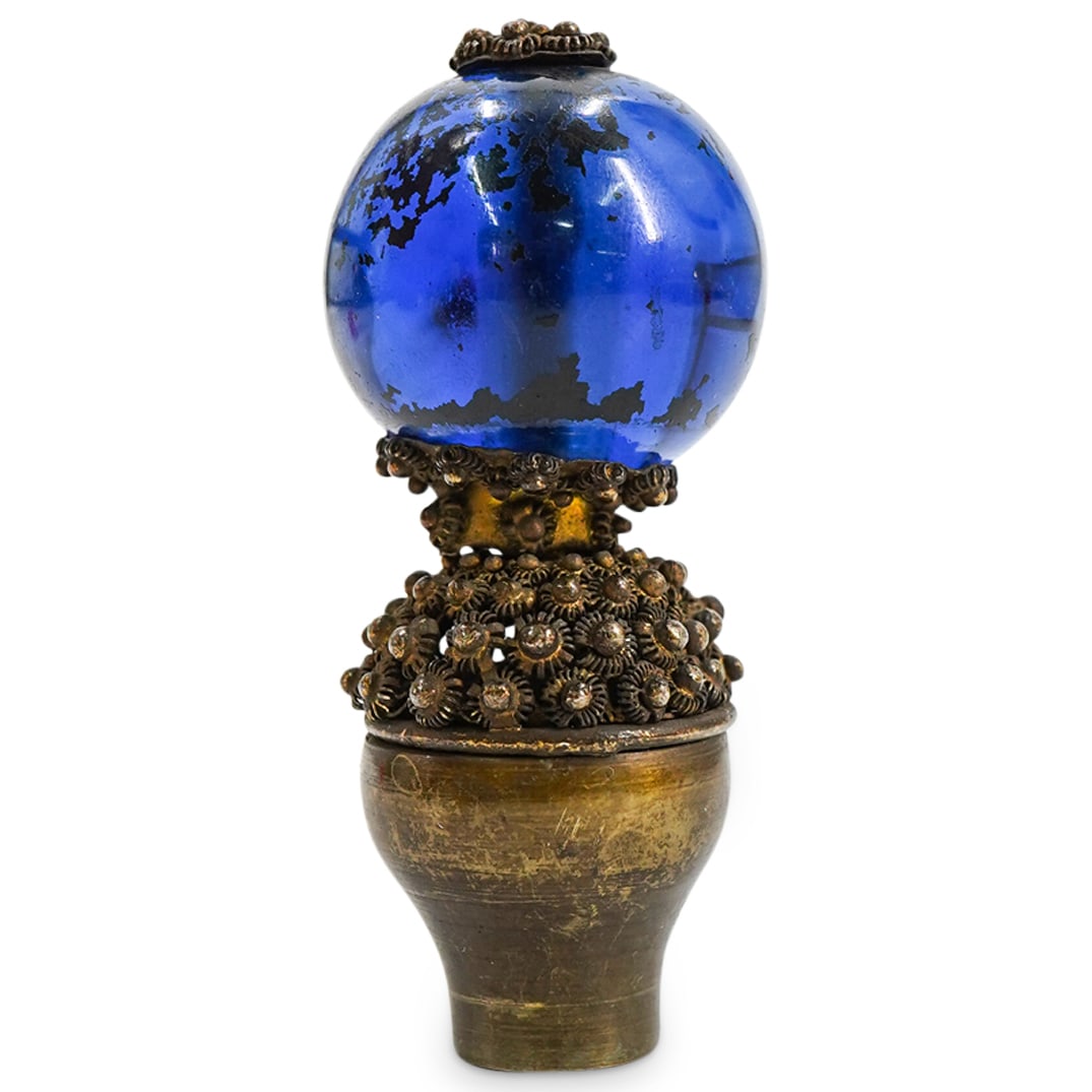 Antique Chinese Mandarin Hat Button: DESCRIPTION: Antique Chinese Mandarin hat button with blue glass sphere and bronze foundation. CIRCA: 19th Cent. ORIGIN: China DIMENSIONS: H: 2.75" x Dia: 1.25" CONDITION: Mild wear to patina, great o