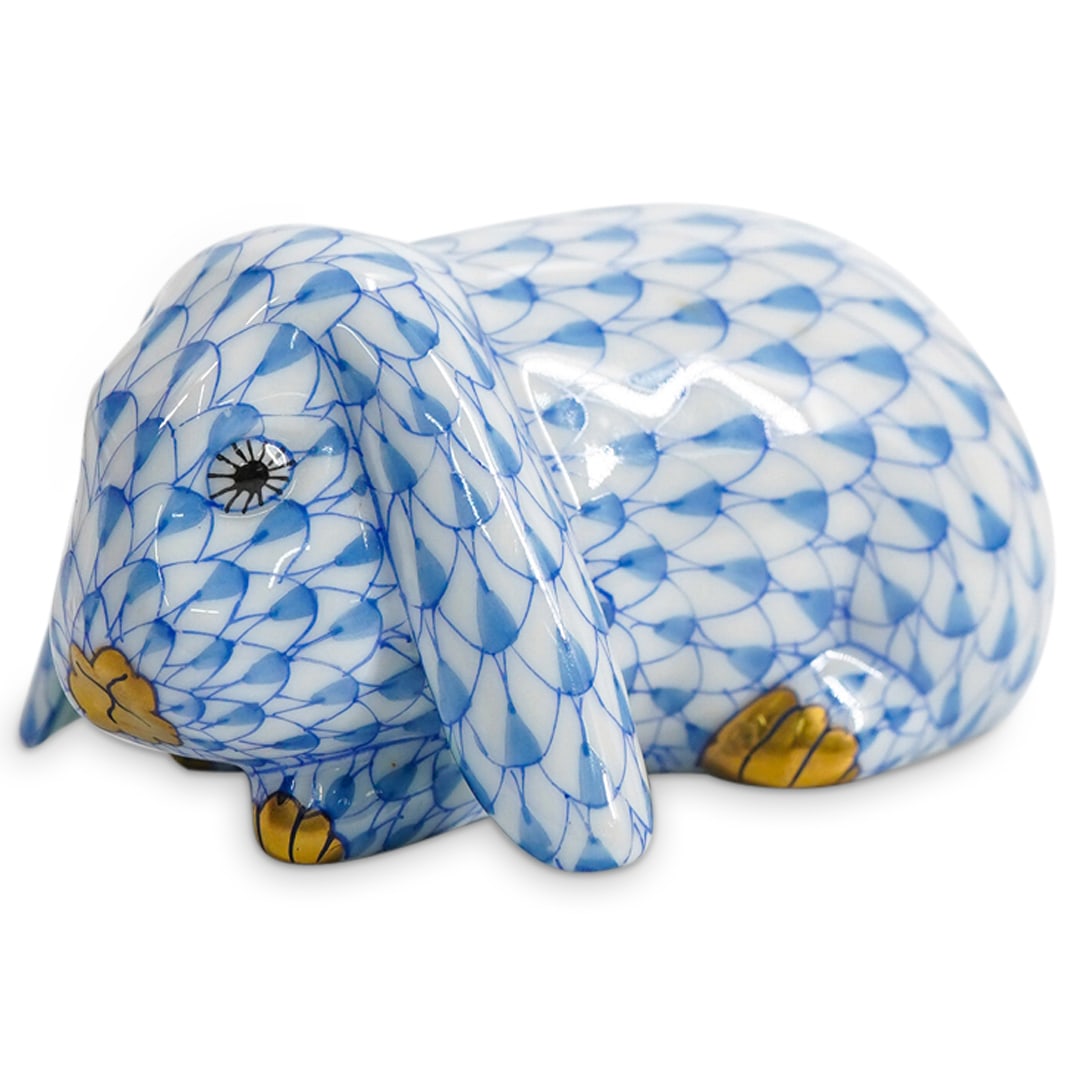 Herend Porcelain "Lop Eared Bunny" Blue Fishnet Figurine: DESCRIPTION: Herend porcelain figurine depicting a "Lop Eared Bunny" and featuring blue fishnet pattern and gilded accents. Style number: #115510. Marked with Herend hallmark on the underside. CIRCA: 