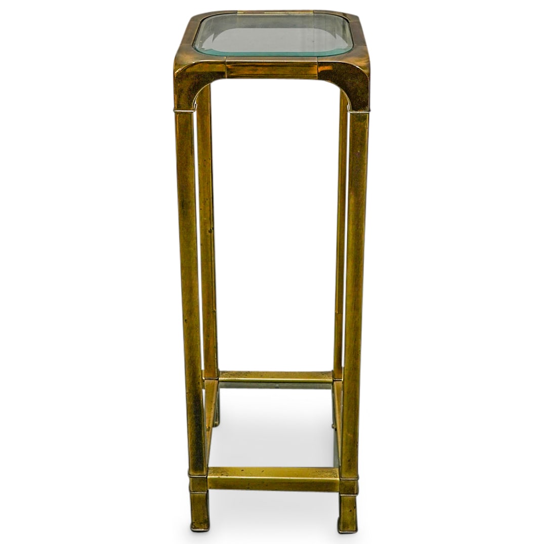 Mastercraft Bronze And Glass Top Two Tier Pedestal: DESCRIPTION: Mastercraft pedestal crafted from bronze with rounded shoulders and fitted with glass top and a glass stretcher. CIRCA: 20th Century ORIGIN: USA DIMENSIONS: H: 36" W: 12" L: 12.25" CONDIT