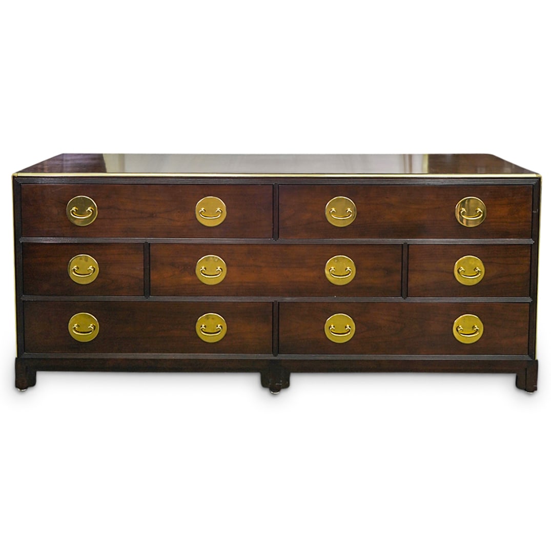 Michael Taylor For Baker Furniture Hollywood Regency Dresser: DESCRIPTION: Vintage dresser by MIchael Taylor for Baker Furniture featuring seven drawers and gilt trimming. Lower left drawer interior bears an emblem emblazoned with company logo. CIRCA: 20th Centu