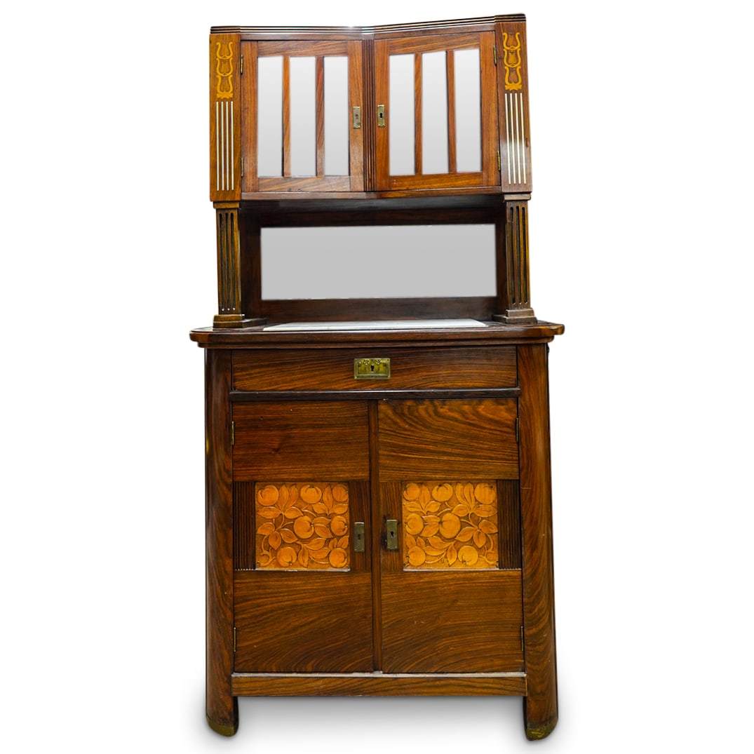 Art Nouveau Carved Wood Cupboard: DESCRIPTION: Art Nouveau carved wood cupboard cabinet. Features a brown wood foundation with double hinged doors, inset with glass, over a mirror backsplash and marble topped surface, continuing to a 