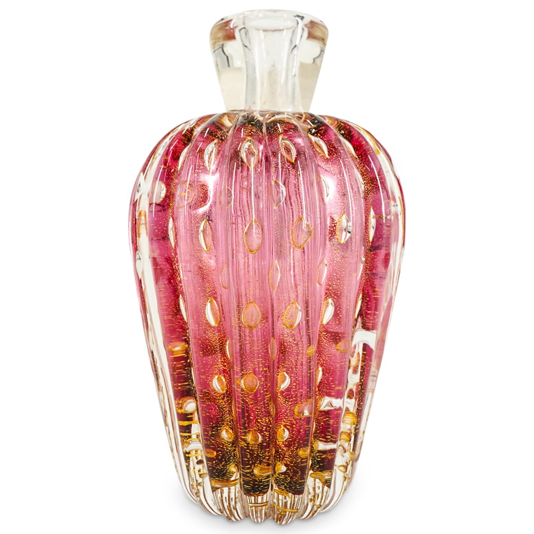 Murano Art Glass Aventurina Perfume Bottle: DESCRIPTION: Murano art glass perfume bottle featuring fluting and gold fleck. CIRCA: Late 20th - Early 21st Century ORIGIN: Italian DIMENSIONS: H: 6.25" Diameter: 3.5" CONDITION: Two spots of minor i
