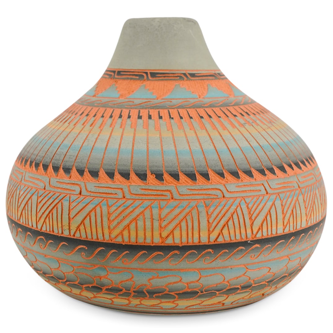 Native American Etched Terracotta Navajo Art Pottery Vase: DESCRIPTION: Native American etched terracotta Navajo art pottery vase depicting etching patterns, and polychrome coloring. WIth etched Navajo Scene on the underside CIRCA: 20th Century ORIGIN: Native