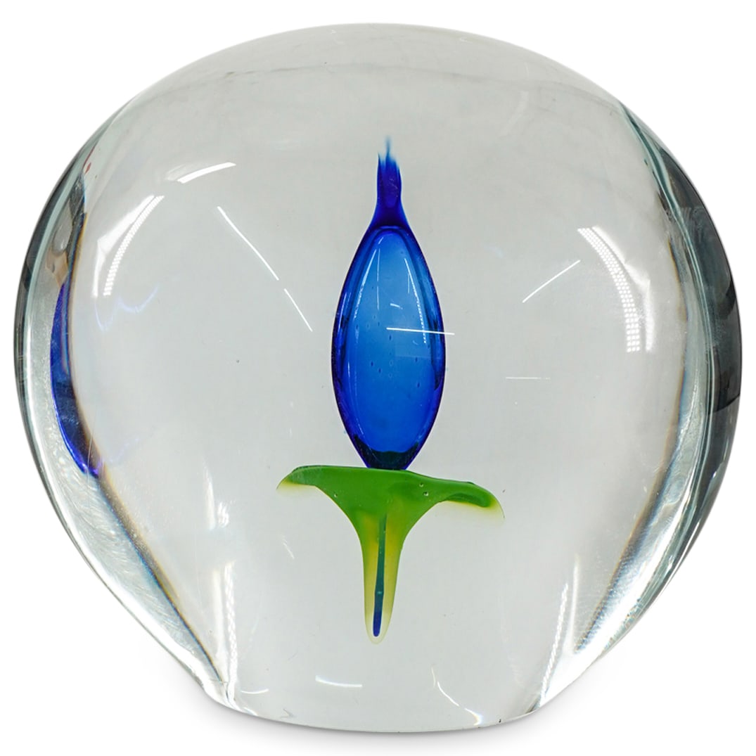 Beranek Floral Glass Paperweight: DESCRIPTION: Beranek glass paperweight featuring polychrome floral motif. CIRCA: Late 20th - Early 21st Century ORIGIN: Czech DIMENSIONS: H: 5.75" W: 3.25" L: 6" CONDITION: One moderate scratch near b