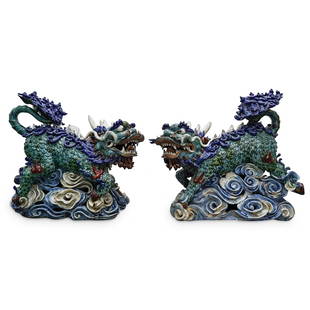 Large Pair Antique Chinese Porcelain Qilin Sculptures: DESCRIPTION: Large pair of antique Chinese polychrome porcelain mirrored sculptures, each depicting a qilin on clouds. CIRCA: Late 19th - Early 20th Century ORIGIN: Chinese DIMENSIONS: