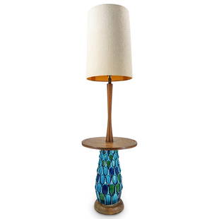 Mid Century Jane & Gordon Martz Style Floor Lamp Table: DESCRIPTION: Mid-century modern Jane & Gordon Martz-style combination floor lamp and table composed of wood and polychrome porcelain with a linen shade. Tested and fully functional. CIRCA: Mid 20th