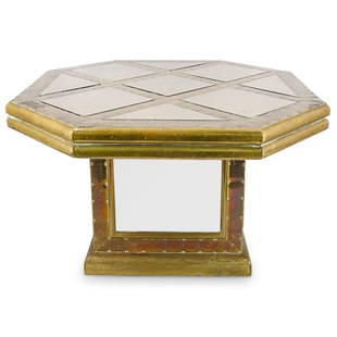 Mid Century Brass Mirrored Accent Table: DESCRIPTION: Mid Century Brass Mirrored Accent Table. Designed with an octagonal form, brass edges and mirrored partitions. CIRCA: Mid 20th Century ORIGIN: DIMENSIONS: H: 18" W: 28 1/2" D: 28 1/2"