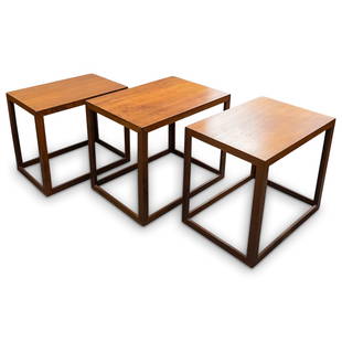 Danish Mid Century Teak Nesting Tables: DESCRIPTION: A set of three Danish Mid-Century nesting tables composed of teak with rectangular graduating forms. CIRCA: Mid 20th Century ORIGIN: Denmark DIMENSIONS: (Largest) H: 18.5" x W: 16.5" x