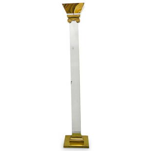 Karl Springer Brass & Lucite Floor Lamp: DESCRIPTION: A Karl Springer designer brass and lucite floor lamp with Corinthian style accents, and modern design. Electrified with foot pedal power switch. CIRCA: 1970s ORIGIN: USA DIMENSIONS: H: