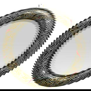 Karl Springer Attrib. Wall Mirror: DESCRIPTION: A large Karl Springer attributed wall mirror with round form, designed with abstract engraved swirling details, and finished with black, silver, and red lacquers. CIRCA: Mid to late 20th