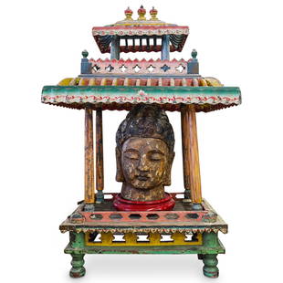 Large Chinese Wood & Metal Shrine: DESCRIPTION: Large Chinese painted wood & metal shrine featuring floral and foliage motifs and housing a large carved wood Buddha head sculpture (not original to the shrine). CIRCA: 20th century or la