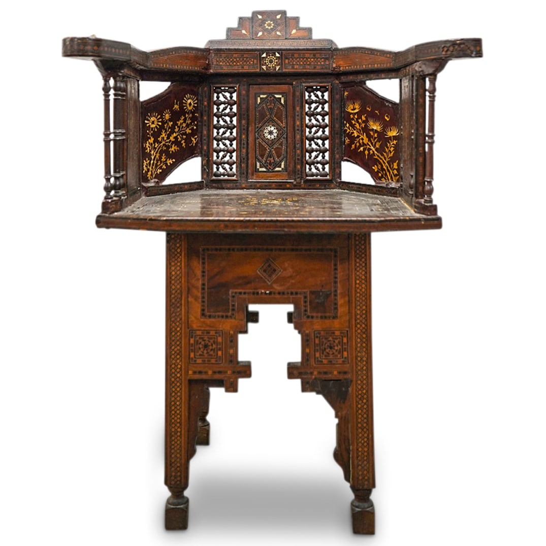 19th Century Syrian Mother Of Pearl Inset Chair: DESCRIPTION: Antique carved wood chair crafted in a geometric design and decorated on its splats with mother-of-pearl insets patterned as flowers, insects, winged creatures, and foliage. Finished with